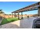 Backyard with pergola, pool and artificial turf at 18404 W Long Lake Rd, Goodyear, AZ 85338