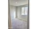 Bedroom featuring neutral colors and carpet at 18404 W Long Lake Rd, Goodyear, AZ 85338