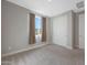 Well-lit bedroom featuring a window and closet at 18404 W Long Lake Rd, Goodyear, AZ 85338