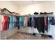 Spacious corner closet with custom shelving and hanging space at 18404 W Long Lake Rd, Goodyear, AZ 85338