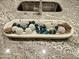 Close up on the kitchen island showcasing the sink and decor at 18404 W Long Lake Rd, Goodyear, AZ 85338