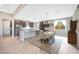 Modern kitchen features granite counters and island at 18404 W Long Lake Rd, Goodyear, AZ 85338