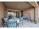 Covered patio with seating area, perfect for outdoor dining at 18404 W Long Lake Rd, Goodyear, AZ 85338