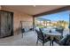 Relaxing patio with seating area and view of the pool at 18404 W Long Lake Rd, Goodyear, AZ 85338