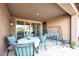 Covered patio with seating area and a swing at 18404 W Long Lake Rd, Goodyear, AZ 85338