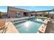 Relaxing pool area with patio and surrounding landscaping at 18404 W Long Lake Rd, Goodyear, AZ 85338