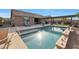 Refreshing swimming pool with a spacious patio and lounge chairs at 18404 W Long Lake Rd, Goodyear, AZ 85338