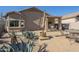 Patio with seating area, grill, and desert landscaping at 18509 N Toya St, Maricopa, AZ 85138