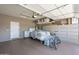 Garage with bikes, storage, and a water heater at 18509 N Toya St, Maricopa, AZ 85138