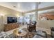 Open-concept living room with a view of the kitchen and dining area at 18509 N Toya St, Maricopa, AZ 85138