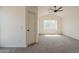 Bright bedroom featuring a ceiling fan and window seat at 19241 N 4Th Pl, Phoenix, AZ 85024