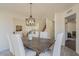 Dining room features a rustic wooden table and view of stairs at 19241 N 4Th Pl, Phoenix, AZ 85024