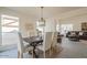 Open concept dining room with view of living room at 19241 N 4Th Pl, Phoenix, AZ 85024