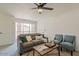 Cozy living room with large windows and a view of the backyard at 19241 N 4Th Pl, Phoenix, AZ 85024