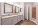 Elegant bathroom with double sinks and granite countertops at 19778 N Coyote Lakes Pkwy, Surprise, AZ 85378