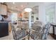 Breakfast nook features a glass-top table and four chairs at 19778 N Coyote Lakes Pkwy, Surprise, AZ 85378