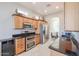 Kitchen with stainless steel appliances and granite countertops at 19778 N Coyote Lakes Pkwy, Surprise, AZ 85378