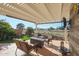 Relaxing patio with pergola, seating, and golf course view at 19778 N Coyote Lakes Pkwy, Surprise, AZ 85378