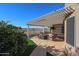 Relaxing patio with pergola, seating, and fire pit at 19778 N Coyote Lakes Pkwy, Surprise, AZ 85378