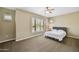 Bright bedroom with large window and ceiling fan at 20660 N 40Th St # 2159, Phoenix, AZ 85050