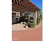 Covered patio with stone pillars and hanging baskets at 20660 N 40Th St # 2159, Phoenix, AZ 85050