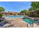 Community pool and spa with ample seating and shade structures at 20660 N 40Th St # 2159, Phoenix, AZ 85050