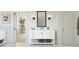 Modern bathroom with white vanity and walk-in shower at 2090 N Woodburne Pl, Chandler, AZ 85224