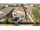 Aerial view of single-story home with backyard and desert landscaping at 21295 N 262Nd Dr, Buckeye, AZ 85396