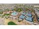 Aerial view of community amenities including pool, tennis courts, and clubhouse at 21295 N 262Nd Dr, Buckeye, AZ 85396