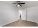 Spacious bedroom with ceiling fan and access to bathroom at 2193 S Tucana Ln, Gilbert, AZ 85295