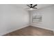 Well-lit bedroom featuring a ceiling fan and a window with blinds at 2193 S Tucana Ln, Gilbert, AZ 85295