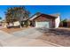 Eye-catching brick home with a two-car garage and driveway at 2193 S Tucana Ln, Gilbert, AZ 85295