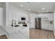 Modern kitchen with white cabinets and quartz countertops at 2193 S Tucana Ln, Gilbert, AZ 85295