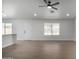 Bright living room featuring hardwood floors and ceiling fan at 2193 S Tucana Ln, Gilbert, AZ 85295