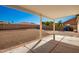 Covered patio with brick pavers, overlooking a spacious backyard at 2193 S Tucana Ln, Gilbert, AZ 85295