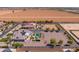 Aerial view of a house, pool, and expansive lot at 21987 E Stacey Rd, Queen Creek, AZ 85142