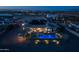 Night view of home with pool, pergola, and landscape lighting at 21987 E Stacey Rd, Queen Creek, AZ 85142