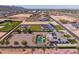 Aerial view of a home with pool and large backyard at 21987 E Stacey Rd, Queen Creek, AZ 85142