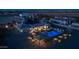 Night view of home with pool, pergola, and landscape lighting at 21987 E Stacey Rd, Queen Creek, AZ 85142