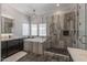 Elegant bathroom with soaking tub, walk-in shower, and modern vanity at 21987 E Stacey Rd, Queen Creek, AZ 85142