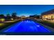 Luxury pool and patio at night with lights at 21987 E Stacey Rd, Queen Creek, AZ 85142