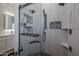 Modern shower with patterned tiles and glass enclosure at 21987 E Stacey Rd, Queen Creek, AZ 85142