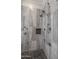 Large walk-in shower with multiple shower heads and pebble floor at 21987 E Stacey Rd, Queen Creek, AZ 85142