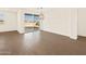 A light-filled room features gorgeous tile flooring and a sliding glass door at 22541 W Pontiac Dr, Surprise, AZ 85387