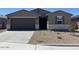 A lovely single-Gathering home featuring a two-car garage and xeriscaping in a tranquil setting at 22541 W Pontiac Dr, Surprise, AZ 85387