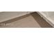 The tile flooring is gorgeous and durable for high traffic areas in this new home at 22541 W Pontiac Dr, Surprise, AZ 85387