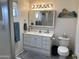 Bathroom featuring white cabinets and a walk-in shower at 2271 S Seminole Dr, Apache Junction, AZ 85119