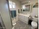 Bathroom boasts a vanity with ample storage and toilet at 2271 S Seminole Dr, Apache Junction, AZ 85119