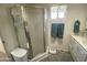 Clean bathroom with corner shower and updated vanity at 2271 S Seminole Dr, Apache Junction, AZ 85119