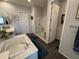 Spa-like bathroom with walk-in shower and separate soaking tub at 22917 E Camina Buena Vis, Queen Creek, AZ 85142